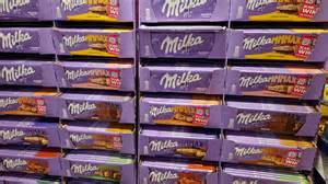 Regalansicht: Milka Riegel und Tafeln im Handel