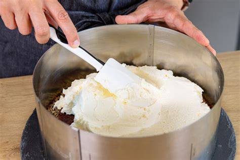 Sahnecreme auf Apfelschicht