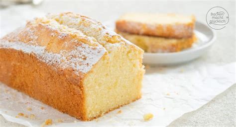 Sandkuchen mit Puderzucker und Zitronenglasur