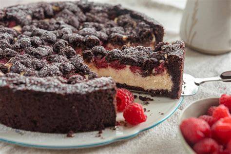 Schema: Schichten des gebackenen Schoko-Cheesecake mit Schokoboden, Füllung und Topping