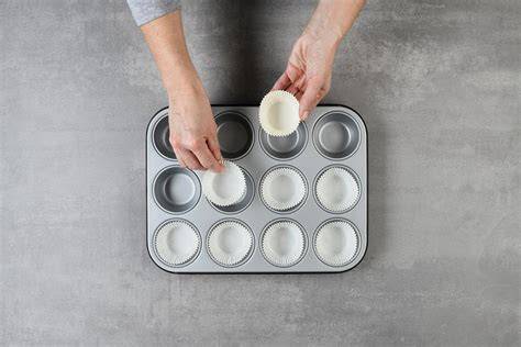 Schematische Grafik: Formenvergleich Muffinblech vs. Souffléförmchen mit Backzeiten