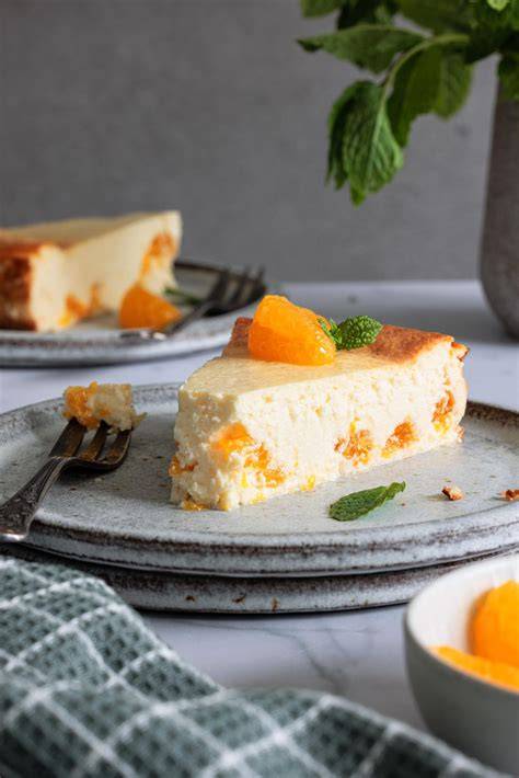 Schneller Käsekuchen ohne Boden, mit Mandarinen belegt