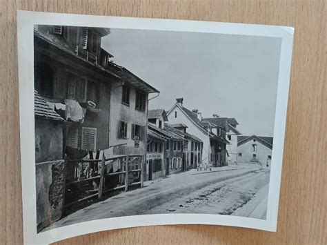 Schoko Kasper Ladenfront und historische Aufnahme