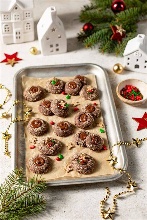 Schoko-Engelsaugen Teigkugeln mit Mulden vor dem Backen