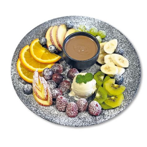 Schokoladenfondue mit frischem Obst und Gebäck