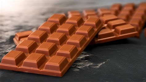 Schokosticks und Tafelschokolade nebeneinander