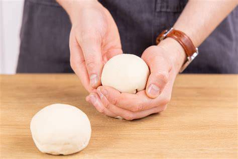 Schritt-für-Schritt: Teigkugeln formen und auf Backblech setzen