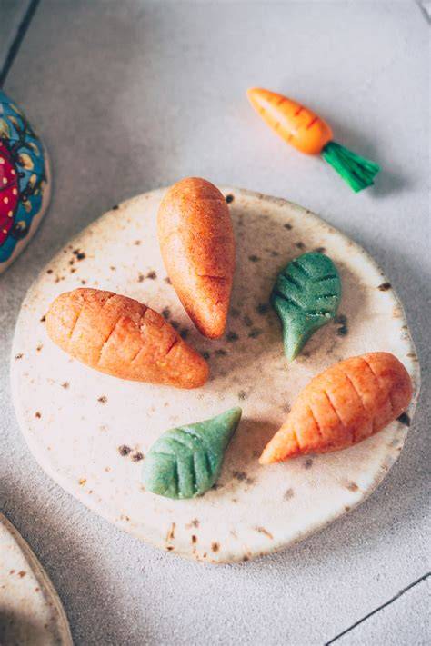Selbstgemachte und industrielle Marzipan-Möhren