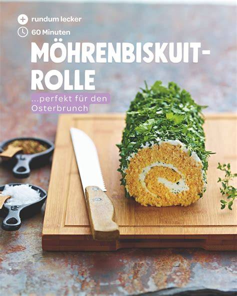 Serviervorschlag: Biskuitrolle auf Buffet mit Kräuterdeko