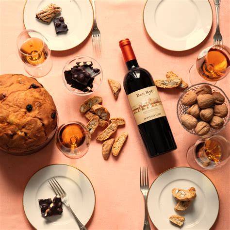 Sizilianischer Süßwein Ben Ryé von Donnafugata mit Trüffelpralinen auf einem Tisch