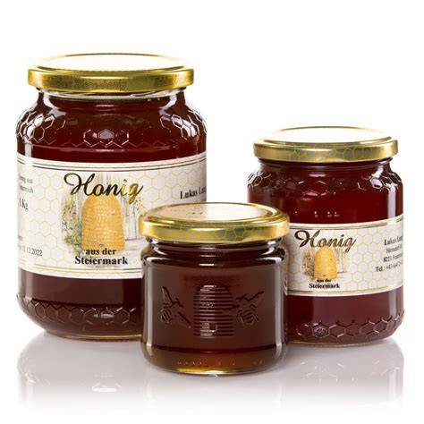 Sortiment an Portionsprodukten: Milchportionen, Marmeladen, Honig