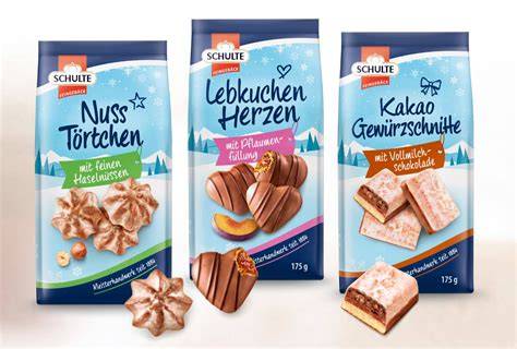 Sortiment von fein verpacktem Lebkuchen und Feingebäck in Geschenkverpackungen