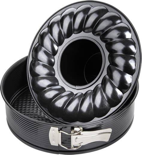 Springform mit Kranzkucheneinsatz und eingefettete Form