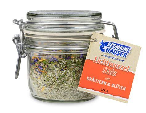 Springkraut-Honig im Glas neben Blüten