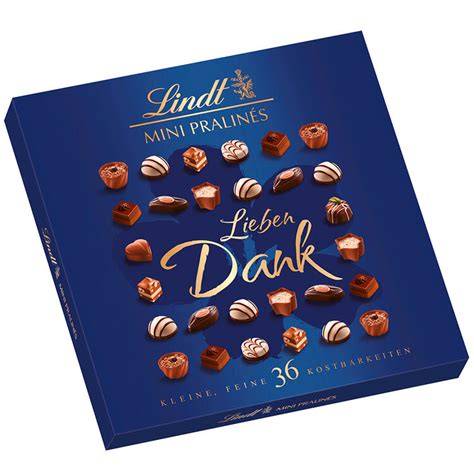 Stimmungsvolle Produktaufnahme: Lindt Mini Pralinés „Danke“-Banderole mit Herzen