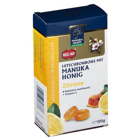 Streudose mit Manuka Honig Zitrone Lutschbonbons und Zitronenscheiben