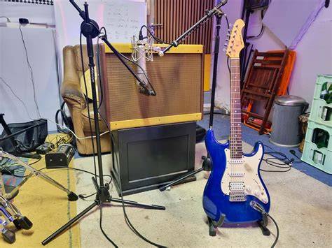 Studioaufnahme: Gitarre und Aufnahme-Equipment