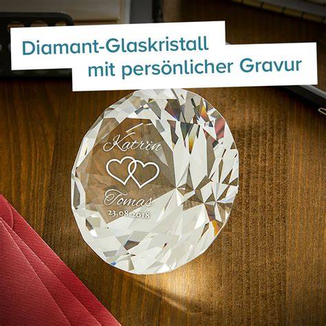 Swarovski Kristall mit kupferfarbener Nase und weißen Aufdruck