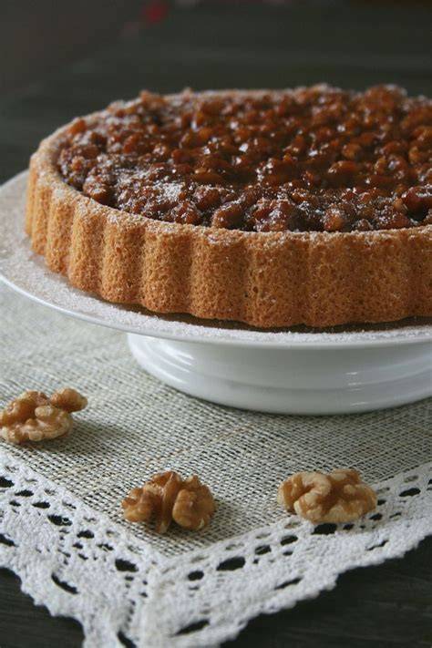 Tarte garniert: Fleur de sel und gehackte Nüsse