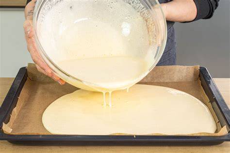 Teig auf Backblech glatt gestrichen
