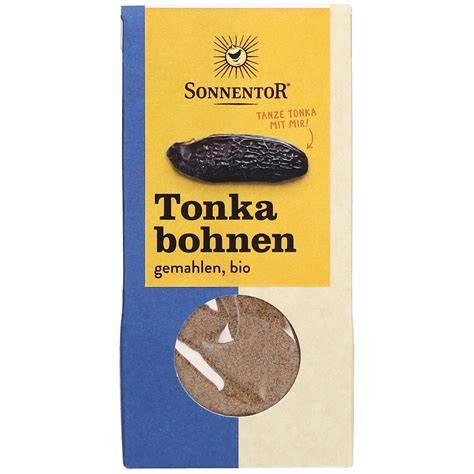 Tonkabohnen und gemahlenes Tonkabohnenpulver