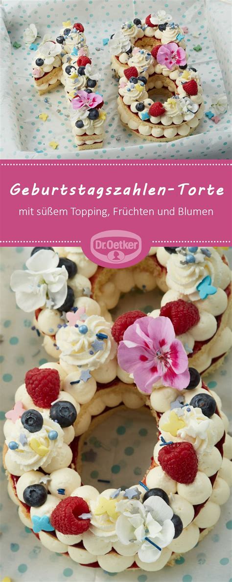 Torte in Ziffernform reich dekoriert mit Früchten, Blumen und Süßigkeiten