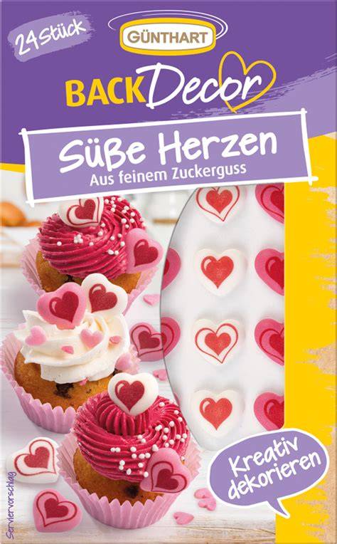 Tortendekorationen mit Herzen und Valentinstagssymbolen