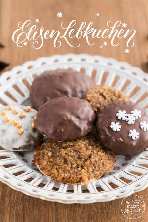 Unterschied Elisenlebkuchen vs. klassische Lebkuchen - Infografik (Nuss-/Mehl-Anteil, Oblaten)