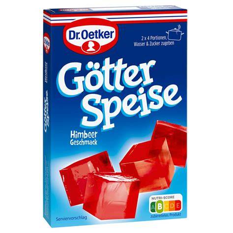 Vegane Götterspeise mit Himbeeren und Vanillesoße serviert