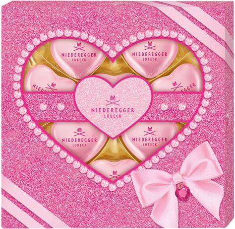 Verpackung der Niederegger Praliné Herzen Marc de Champagne „Glam“ 125g