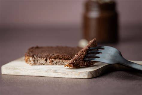 Verschiedene Präsentationsmöglichkeiten: Schokocreme auf Pancakes, Brot und als Topping