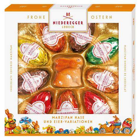 Verschiedene Produkte und Geschenkverpackungen von Niederegger