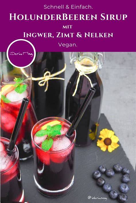 Verschiedene Sirupflaschen: Holunder, Beeren, Zitrone
