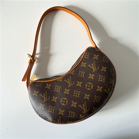 Vintage Louis Vuitton Croissant Sammlung in Vitrine