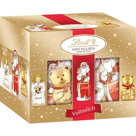 Weihnachtliche Schokoladenfiguren und Geschenkboxen