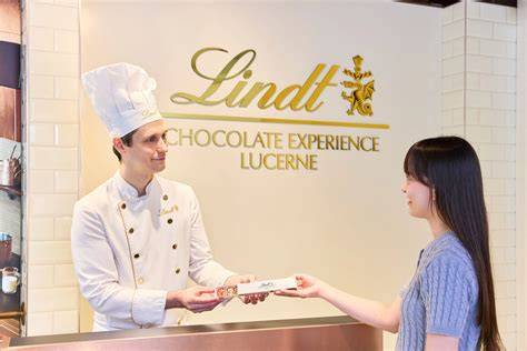 Weltkarte mit Lindt Produktionsstandorten in Europa und den USA