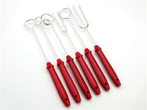 Werkzeuge: Spritzbeutel, Pralinengabel, Thermometer