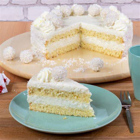 Zutaten für Raffaello Torte (Butterkekse, Kokosraspeln, Frischkäse, Sahne, Raffaello)