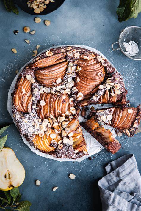 Zutaten für Schoko-Birnen-Kuchen: Birnen, Butter, Eier, Mehl, Kakao, Schokolade