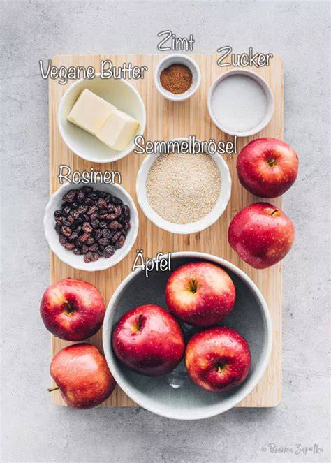 Zutaten-Infografik: Apfelsorten, Marzipan, Zimt, Rosinen im Überblick