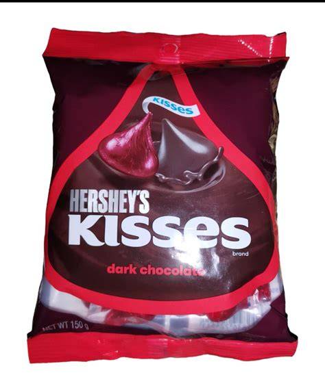 dark chocolate kisses auf kuchengitter mit kuvertüre