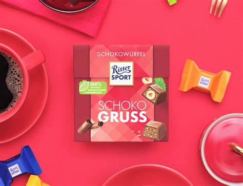 pinkfarbene Box mit 22 bunten Schokowürfeln